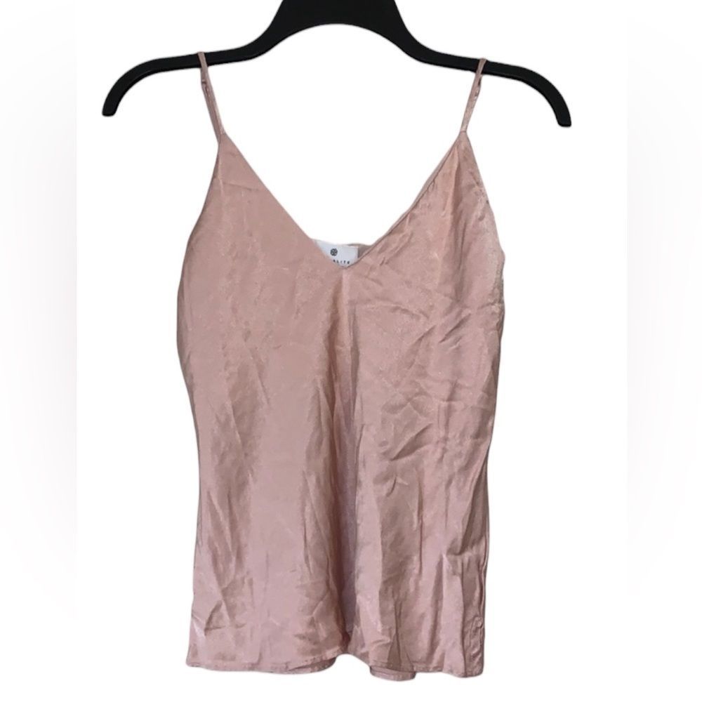 Socialite. Saks off 5th Avenue. Soft pink top. Small. Used & in great condition.